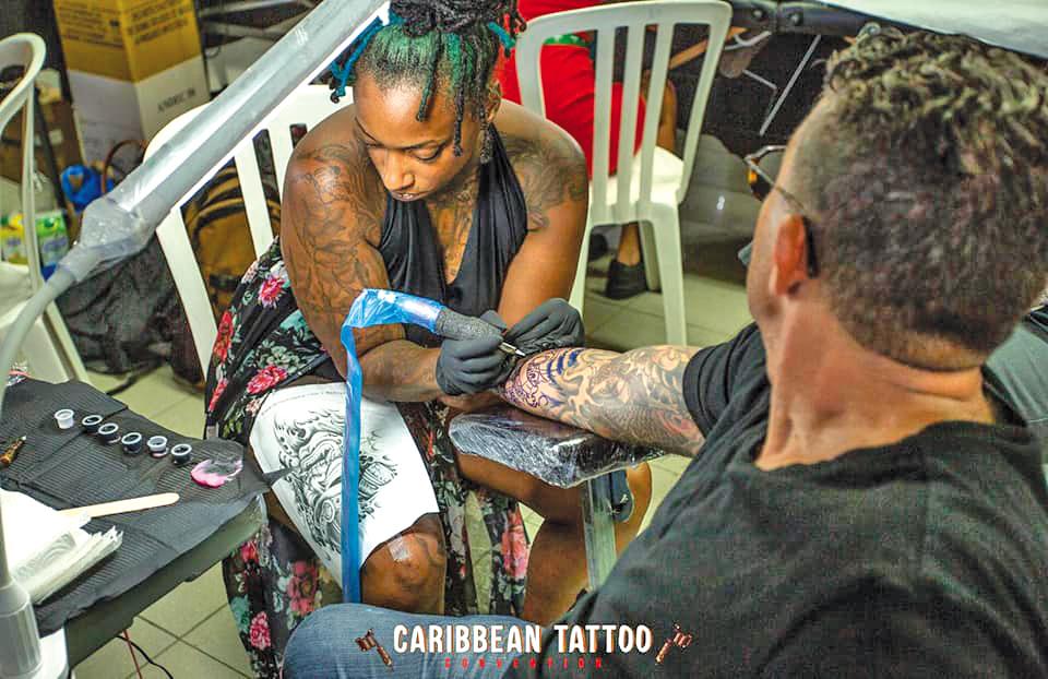 Caribbean Taíno indian style themed left arm sleeve tattoo tattoo idea |  TattoosAI